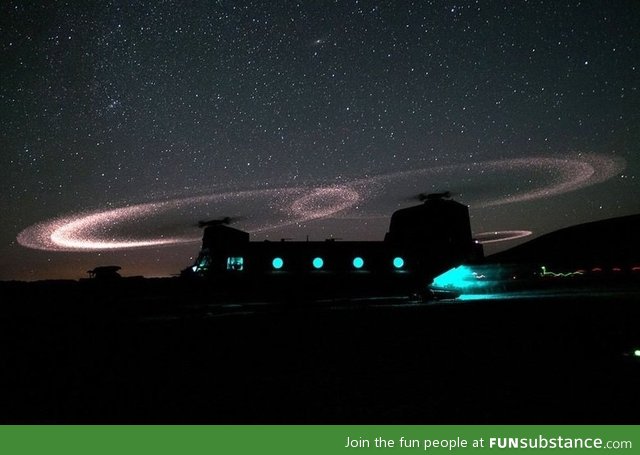 When helicopter blades strike sand in the air