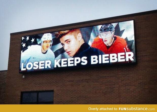 Canada VS USA hockey game tomorrow. This is a billboard in Chicago.