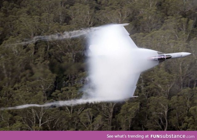 Super hornet visibly breaks the sound barrier