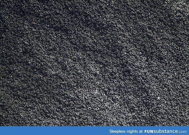 Aerial view of a scrap tire dumpyard