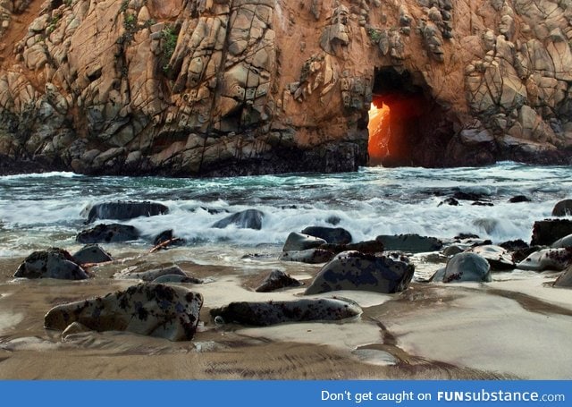 Sunset through a cave