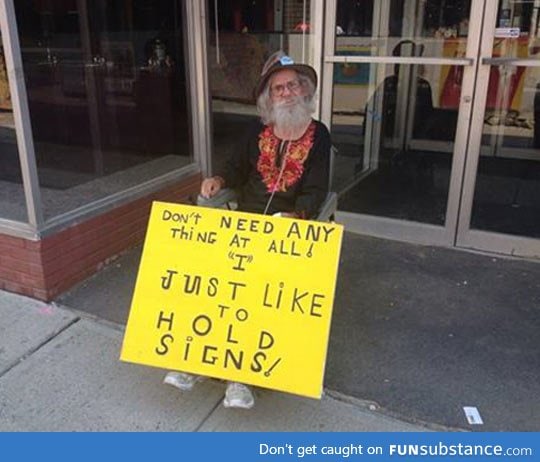 He just likes to hold signs