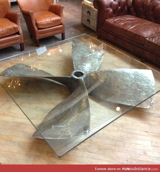 Propeller glass table