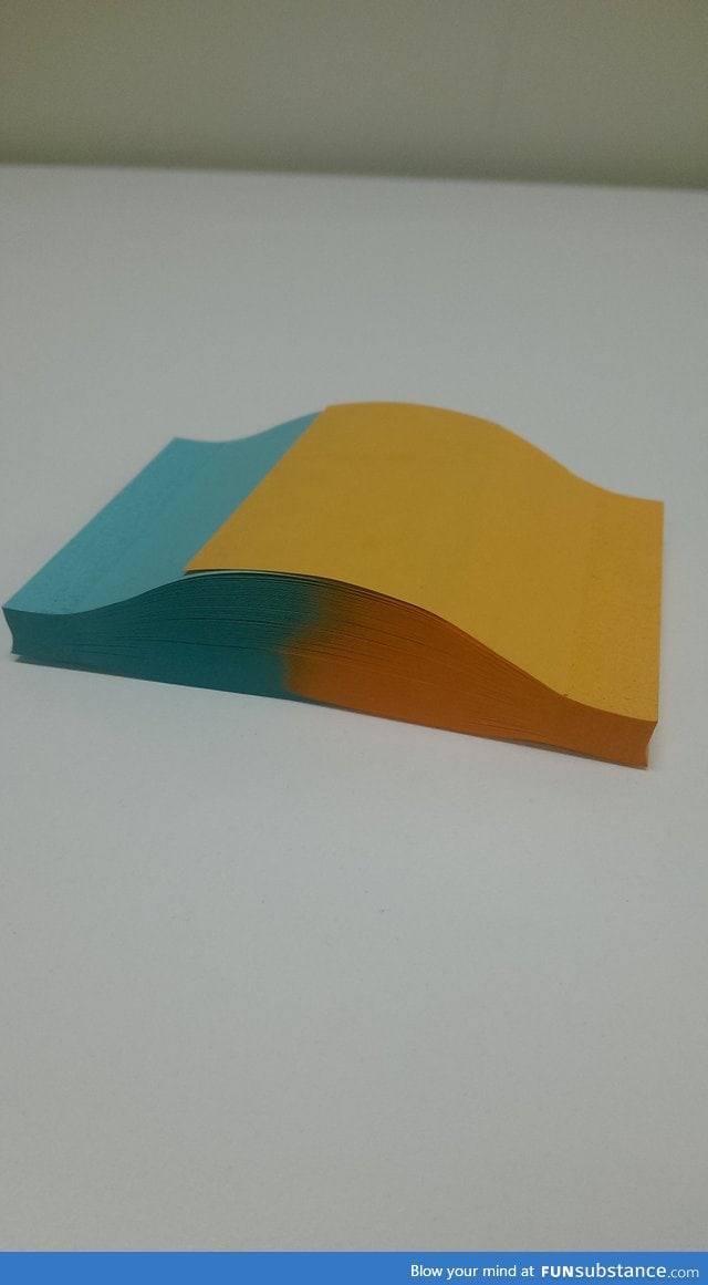 Someone took the time to stack these two post-it-note stacks together