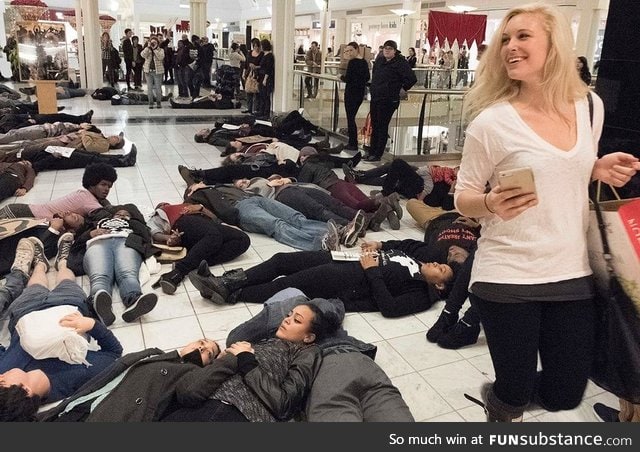 People are hating and judging this woman for shopping during a protest. Oh I salute her