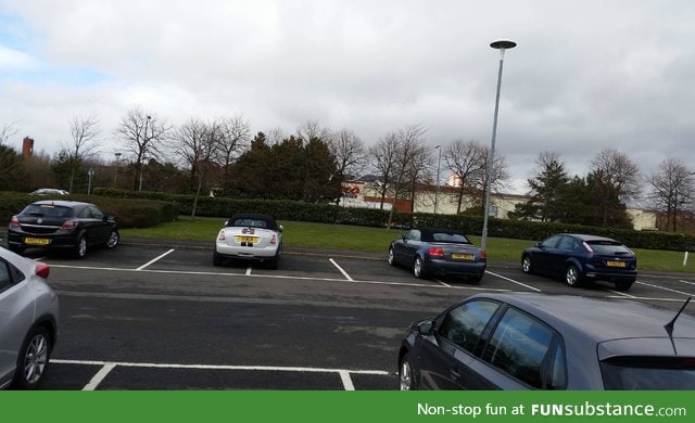 4 assholes, 1 car park