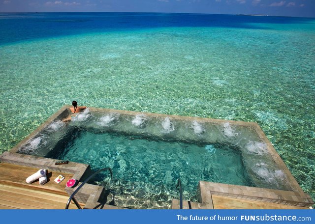 This hot tub is built into the bay!