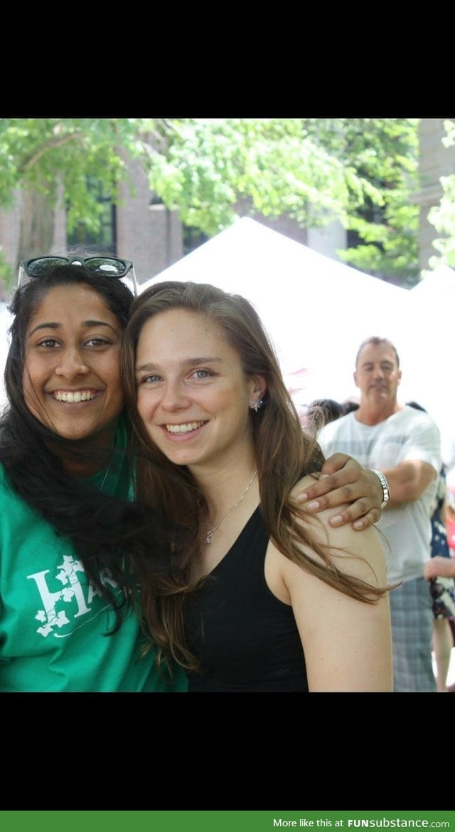 The man in the back of his picture looks like his hand is on the girl's shoulder