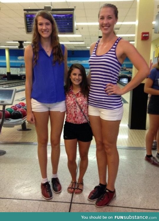 UCF's two tallest volleyball players and shortest cheerleader