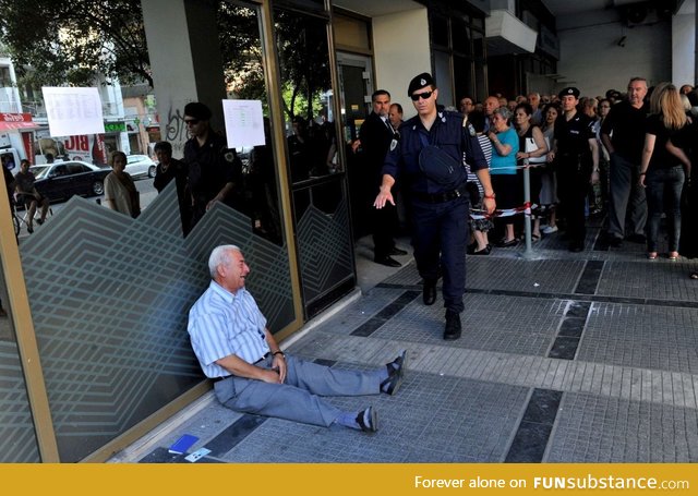 This old Greek man is crying, cause he can't cash out his money of the bank