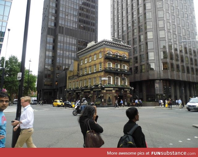 An old pub in the middle of modern day London