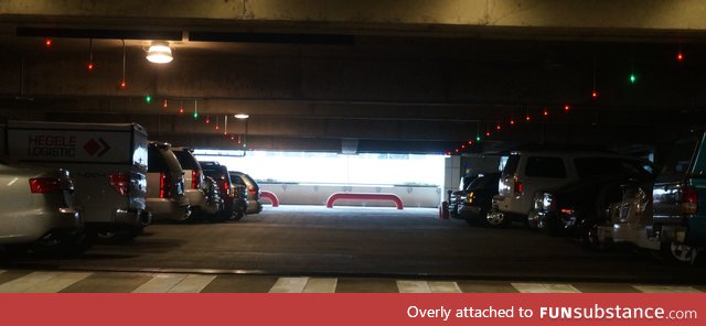 This parking lot has lights showing you the empty spaces. Genius