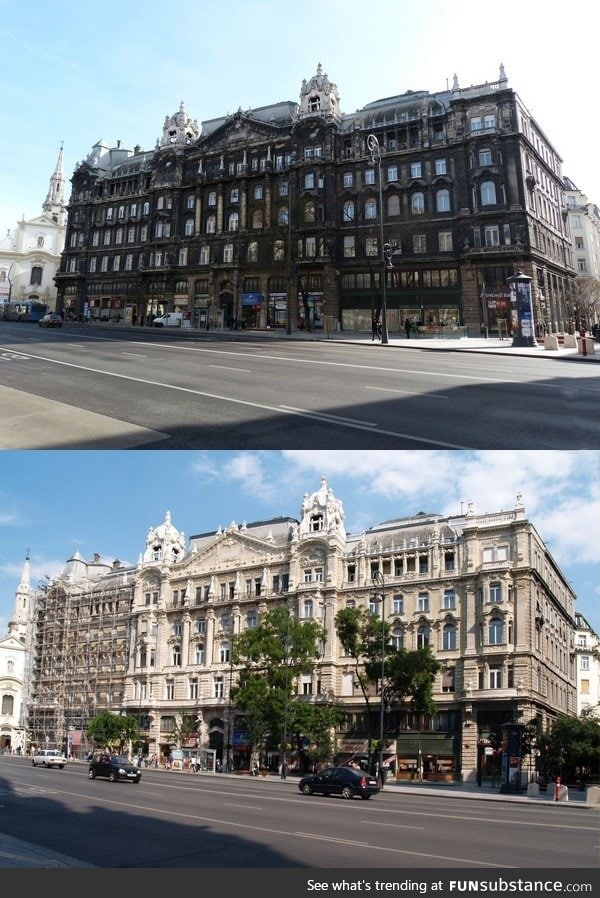 Decades of filth washed away from an old building in Budapest, Hungary