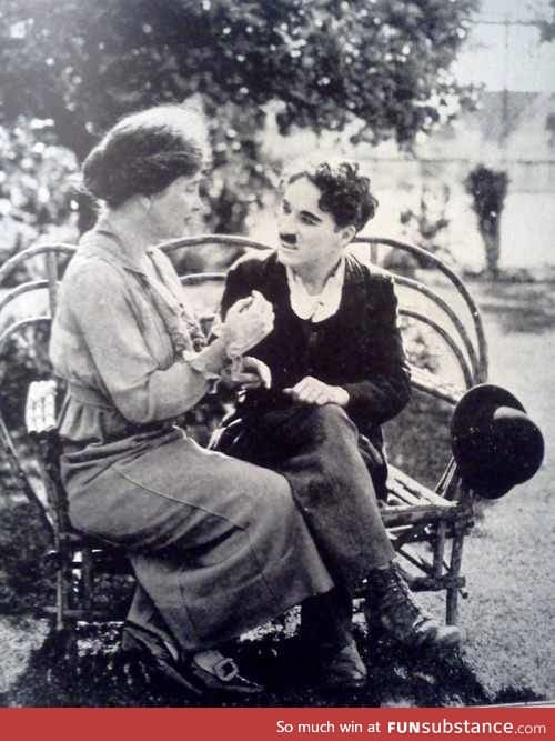 Helen Keller teaching Charlie Chaplin sign language