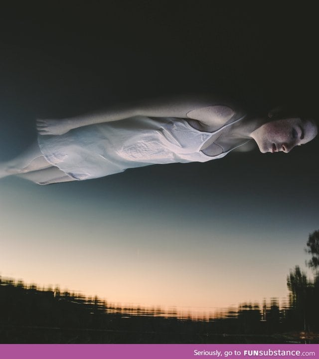 Floating in a lake at sunset