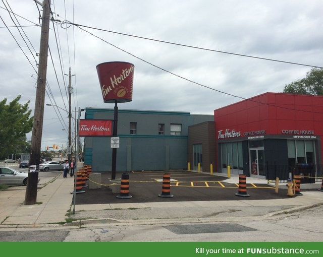 This Tim Hortons turned an old KFC bucket sign into a giant coffee cup