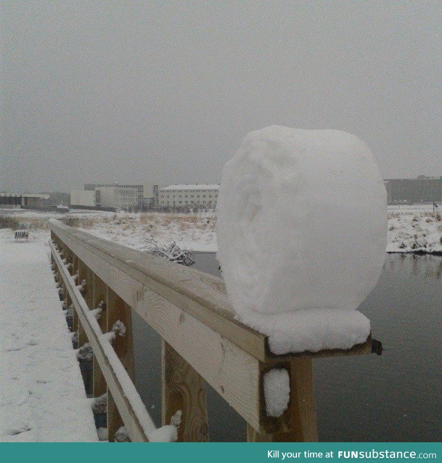 The wind naturally curled this snow into a roll