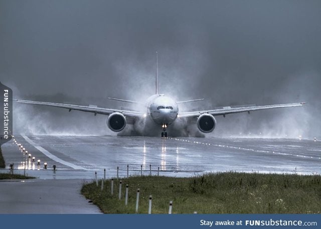 Plane landing in stormy weather