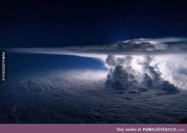 This picture of a thunderstorm at night over the Pacific ocean was taken at 37,000 feet