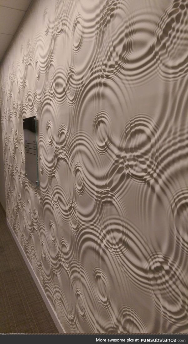 The texture on this wall looks like rippling liquid