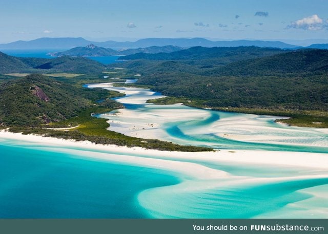 A beach seems to flow through