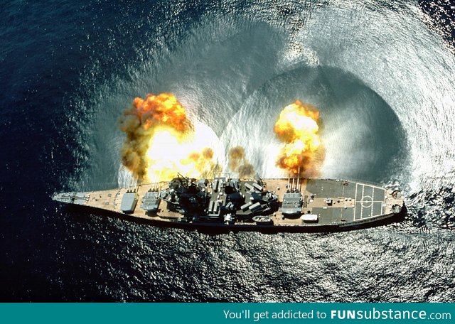 USS Iowa fires a full broadside