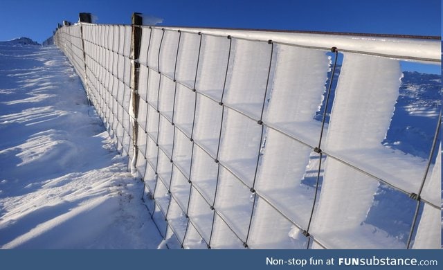 Ice driven through a fence