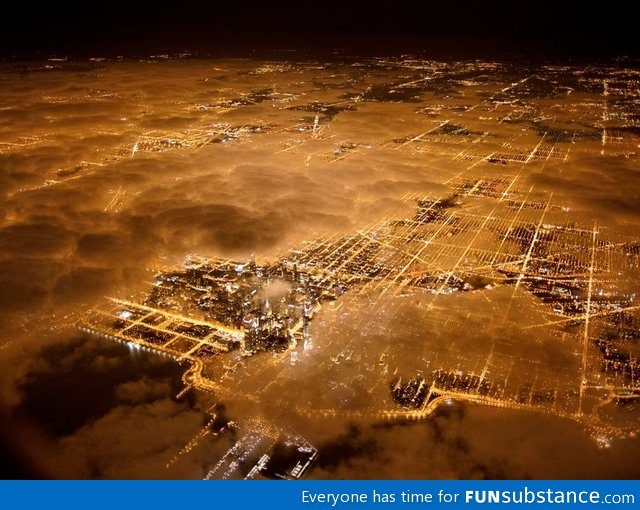 Chicago at night. The clouds look so cool here