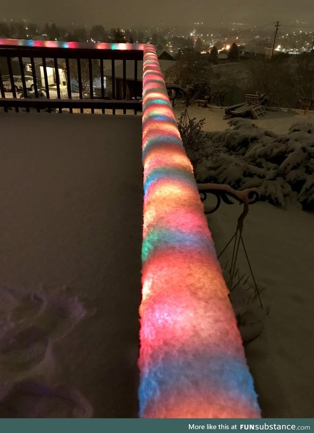 Fresh snow over Christmas lights