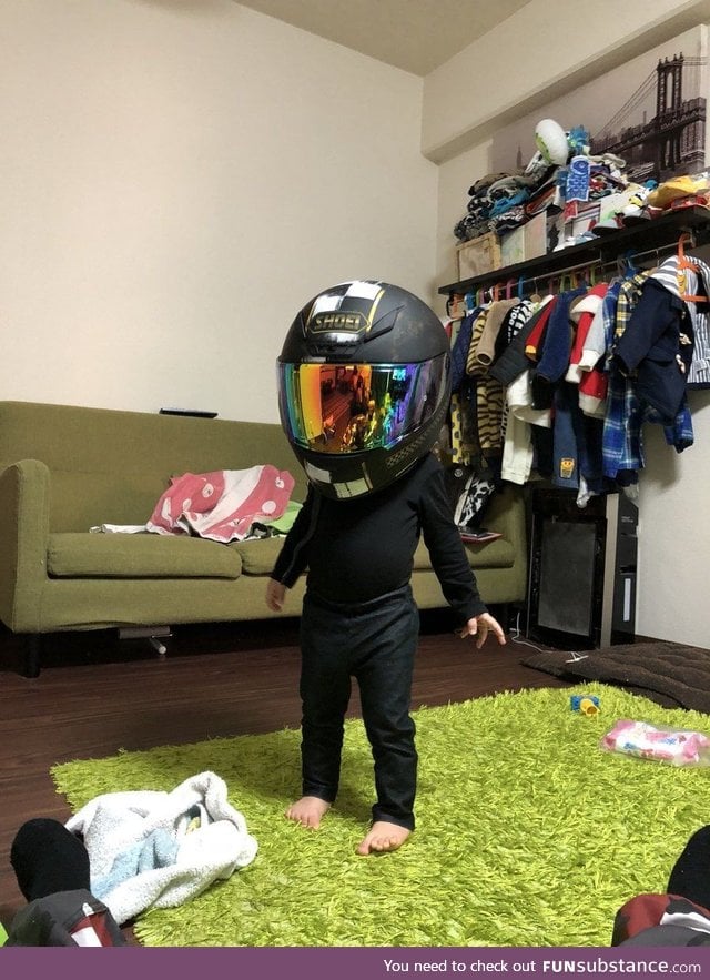 Kid found the helmet