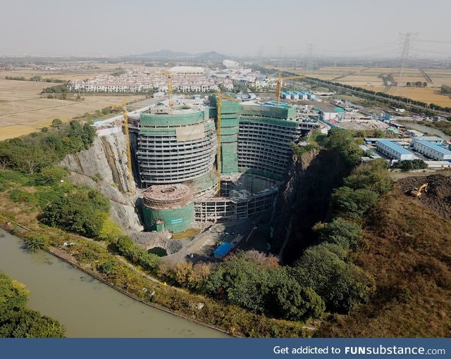 Shanghai luxury hotel being built in an abandoned quarry