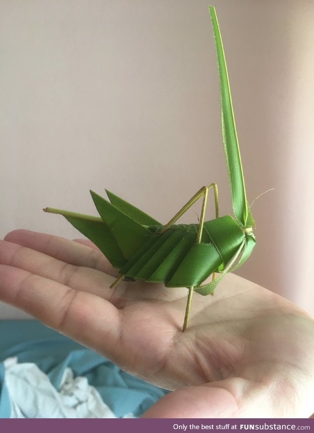 Grasshopper made from one palm leaf