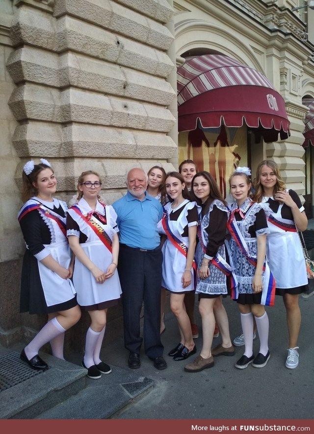 Harold surrounded by Russian schoolgirls