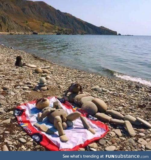 Couple of stoners on a nude beach