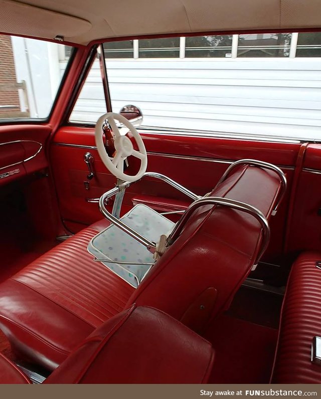 A child's carseat from 1950's