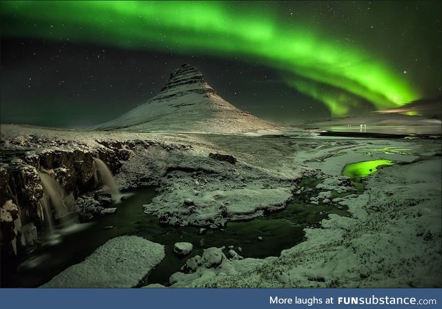 Mt. Kirkjufell lit up by northern lights