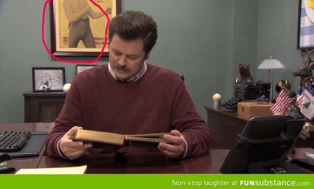 Ron Swanson has a overly manly man picture in his office!!