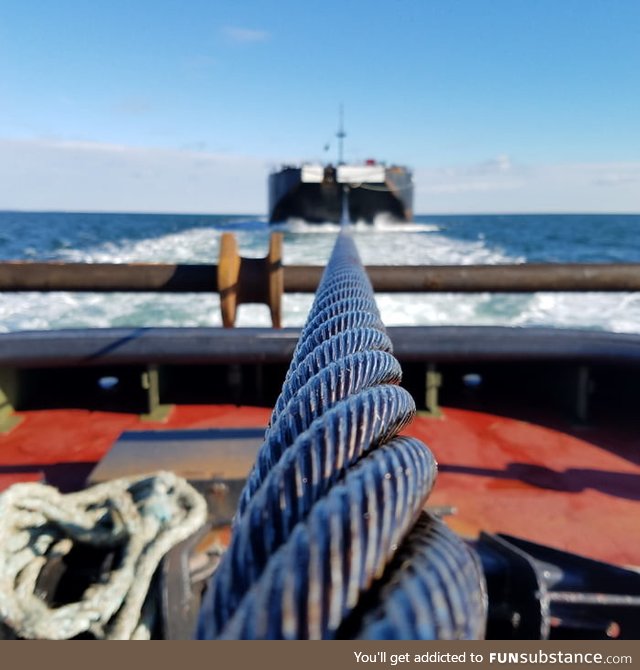 Towing a cargo ship