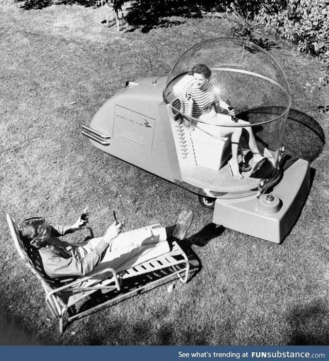 Luxury air conditioned lawn mower of the 1950's