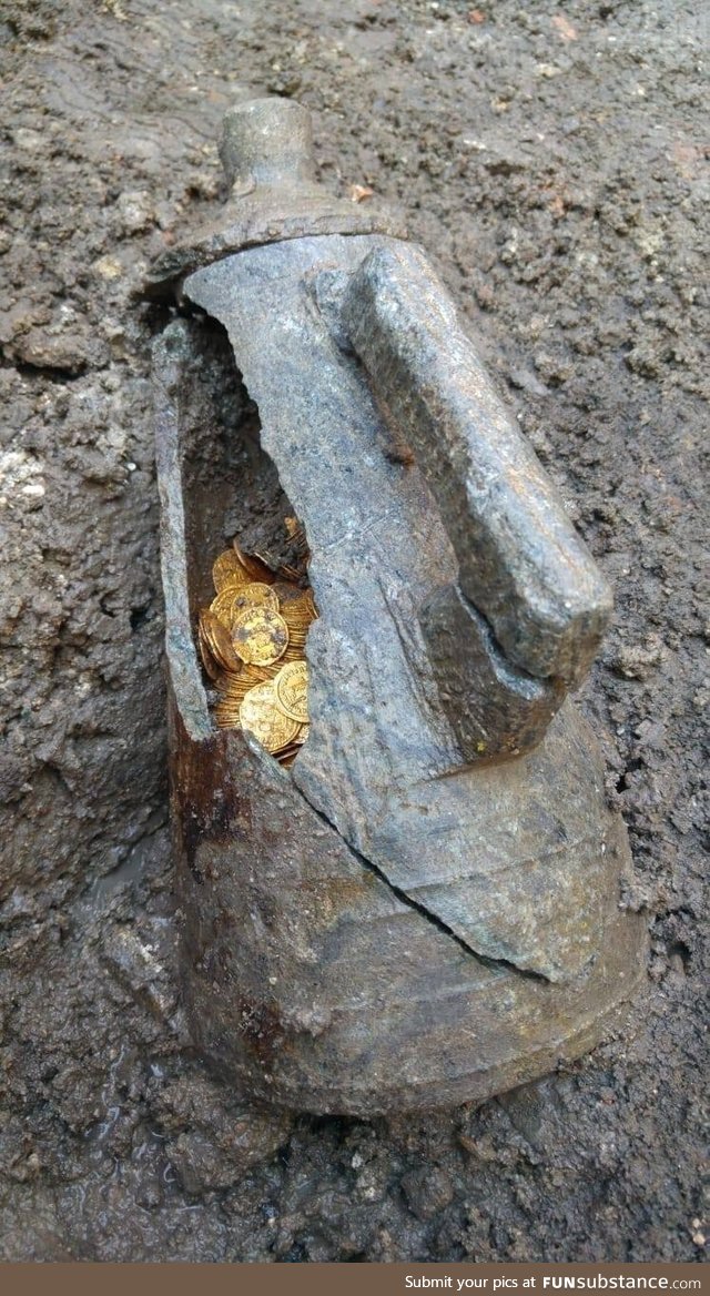 An amphora containing hundreds of 5th-century gold coins