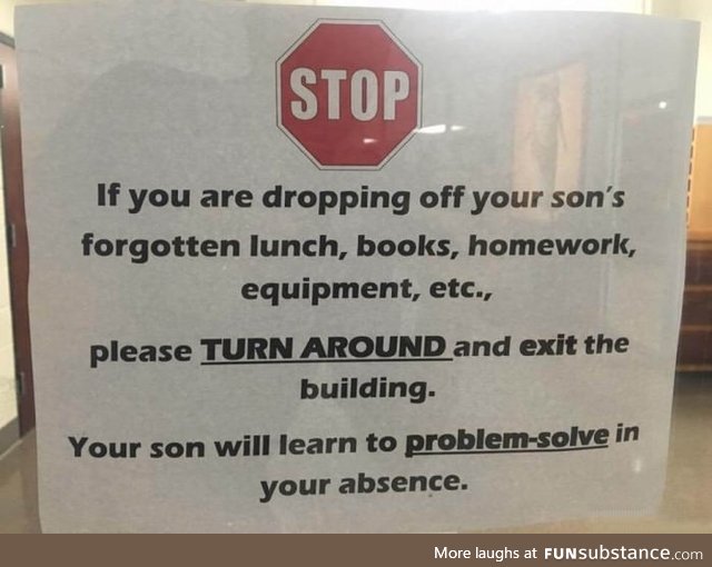 Sign posted on the door of a Catholic high school for boys