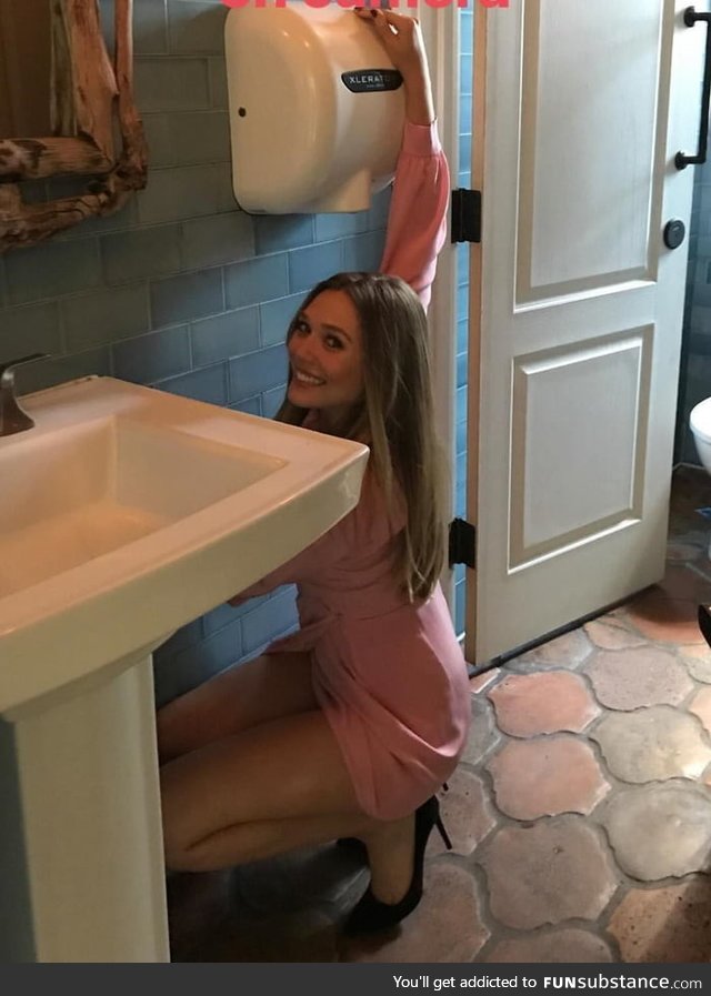 Internet is a weird place where a picture of Elizabeth Olsen fixing sink pipe exists