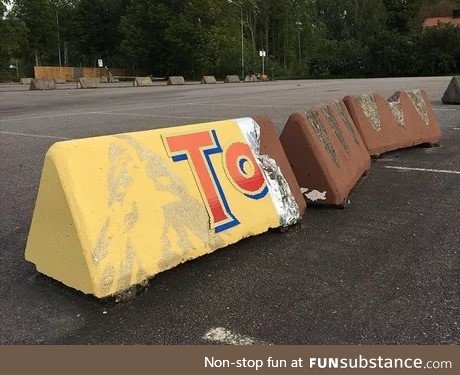 Traffic barrier turned street art