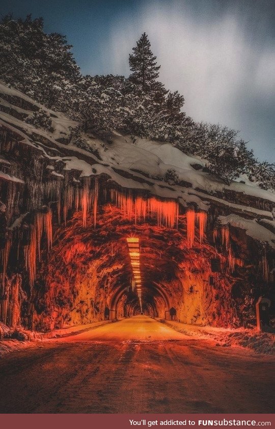 Driving into a warm lit tunnel on a cold winter day