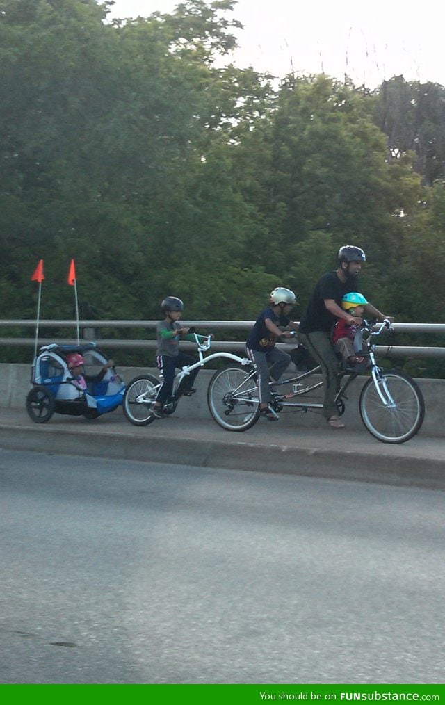 Just an awesome dad guy riding around with his kids