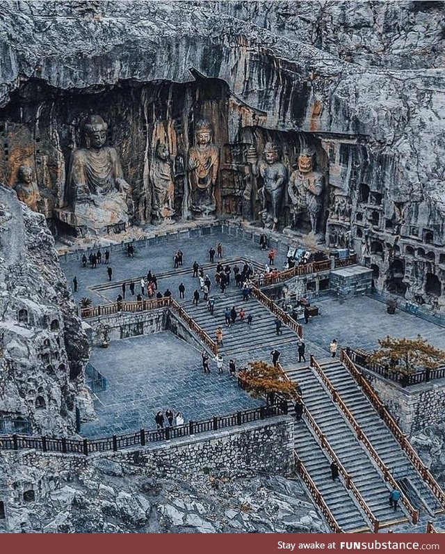 The Longman caves (China), huge Buddhas carved into rock walls