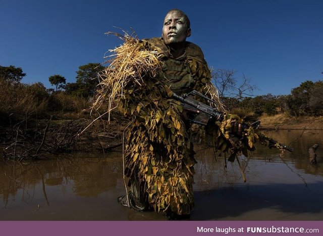 A member of an all-female anti-poaching unit called Akashinga ("The Valiants")