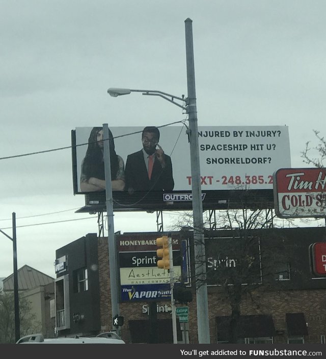 Someone put up this billboard making fun of all of the injury lawyers in Detroit