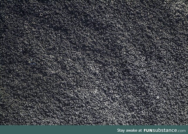 An aerial view of a tire graveyard