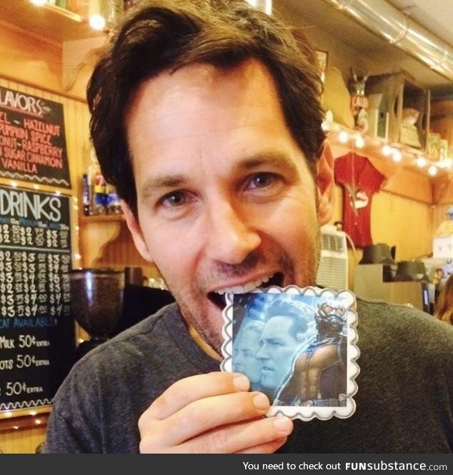 Ant-Man eating an Ant-Man cookie at the Candy Shop he co-owns with Jeffrey Dean Morgan